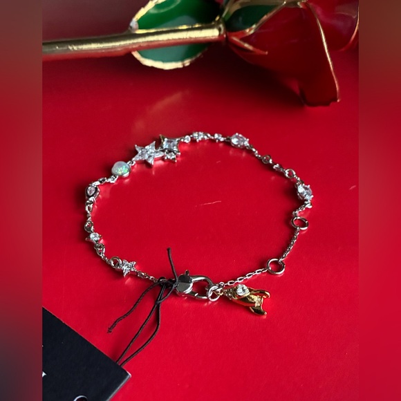Kate Spade Gold and Silver Star Bracelet - Picture 2 of 8